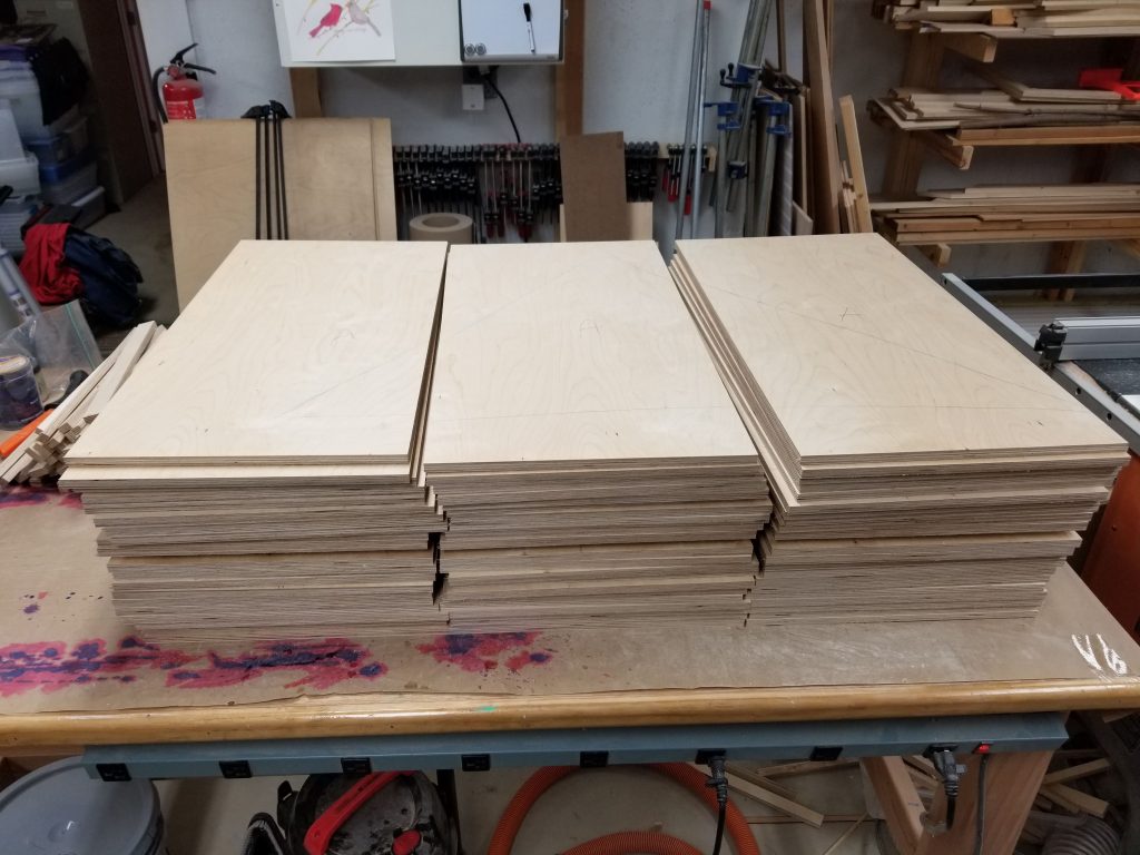 Stack of cut, raw portable tap boards